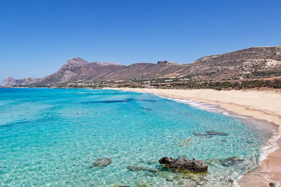 Falassarna beach, western Crete — wide sandy bay with crystal-clear turquoise water